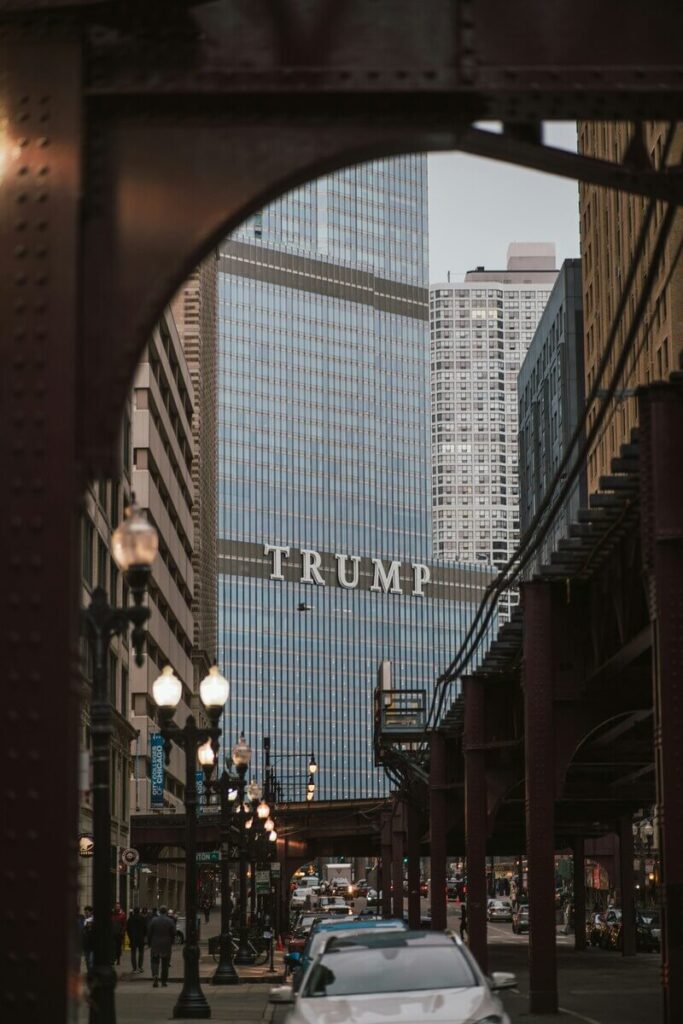 Building with Trump image symbolizing his political influence and mythological analysis in the Myth of Trump online course.